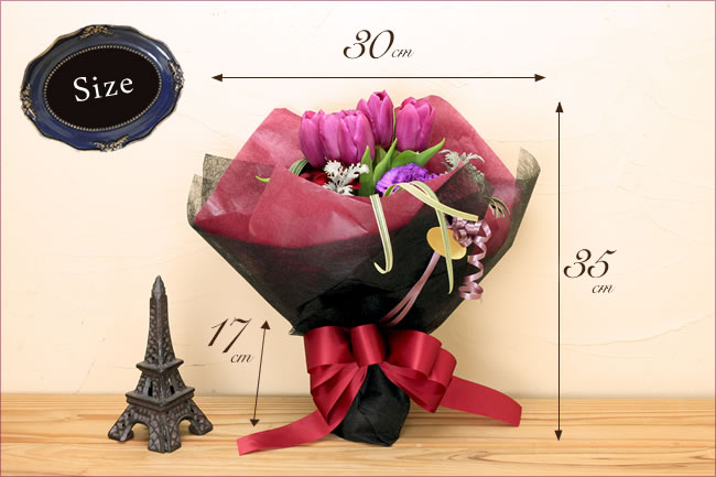こだわりのラッピング こだわってセレクトした色彩の花束をシックでエレガントなラッピングで包みました。