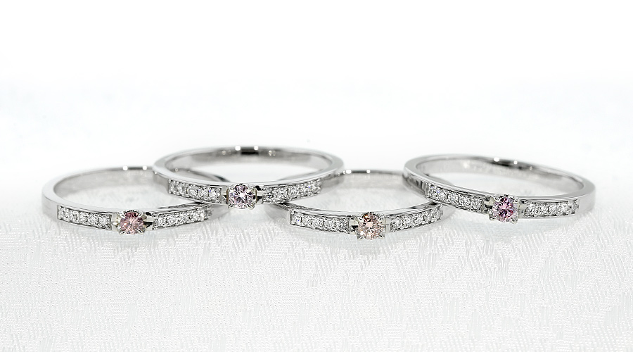 ピンクダイヤモンド リング 0.061ct FANCY ORANGY PINK SI2 ラウンド ブリリアントカット プラチナ Pt ソーティング付の画像