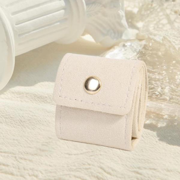 コンパクトな旅行用ジュエリーオーガナイザーバッグ、リング、イヤリング、バケーション用のバックル付きミニ旅行ジュエリーロールバッグ