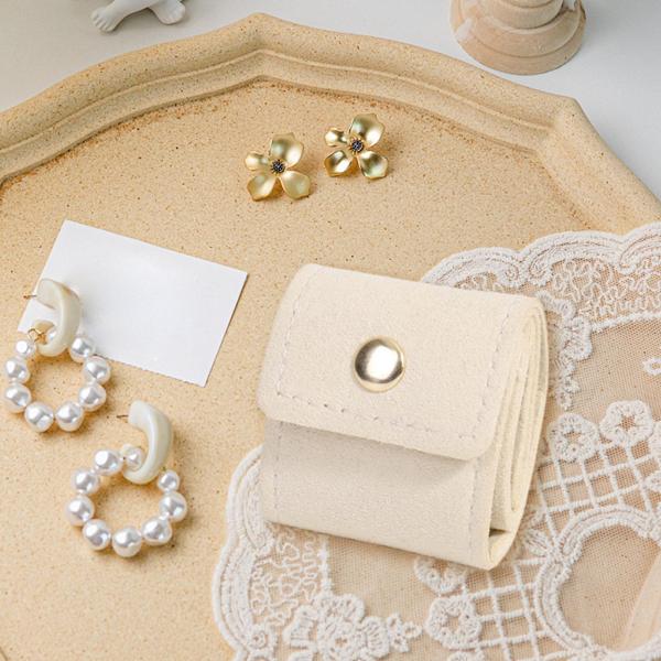 コンパクトな旅行用ジュエリーオーガナイザーバッグ、リング、イヤリング、バケーション用のバックル付きミニ旅行ジュエリーロールバッグ