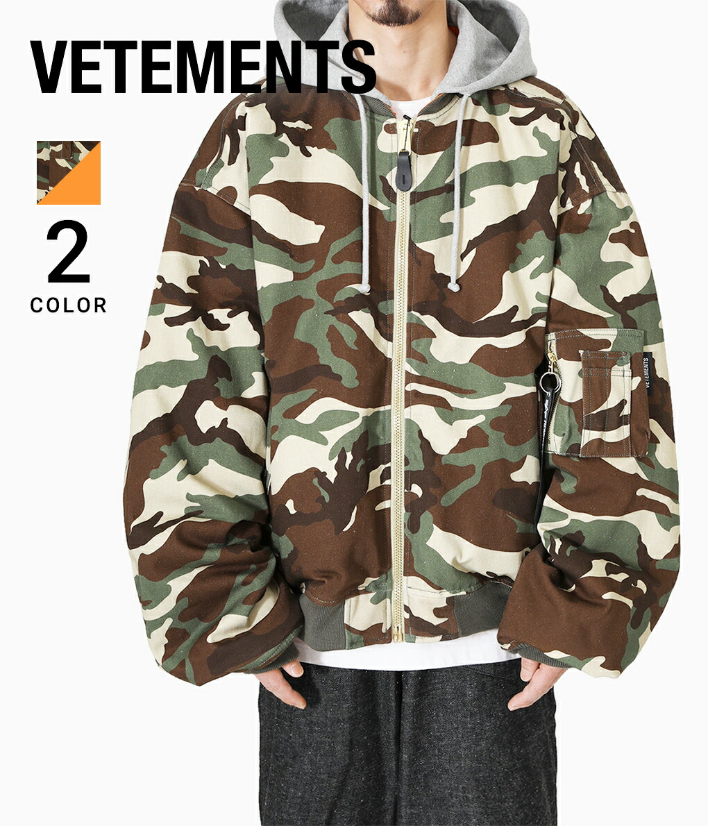 VETEMENTS / ヴェトモン ： HOODED CAMO BOMBER