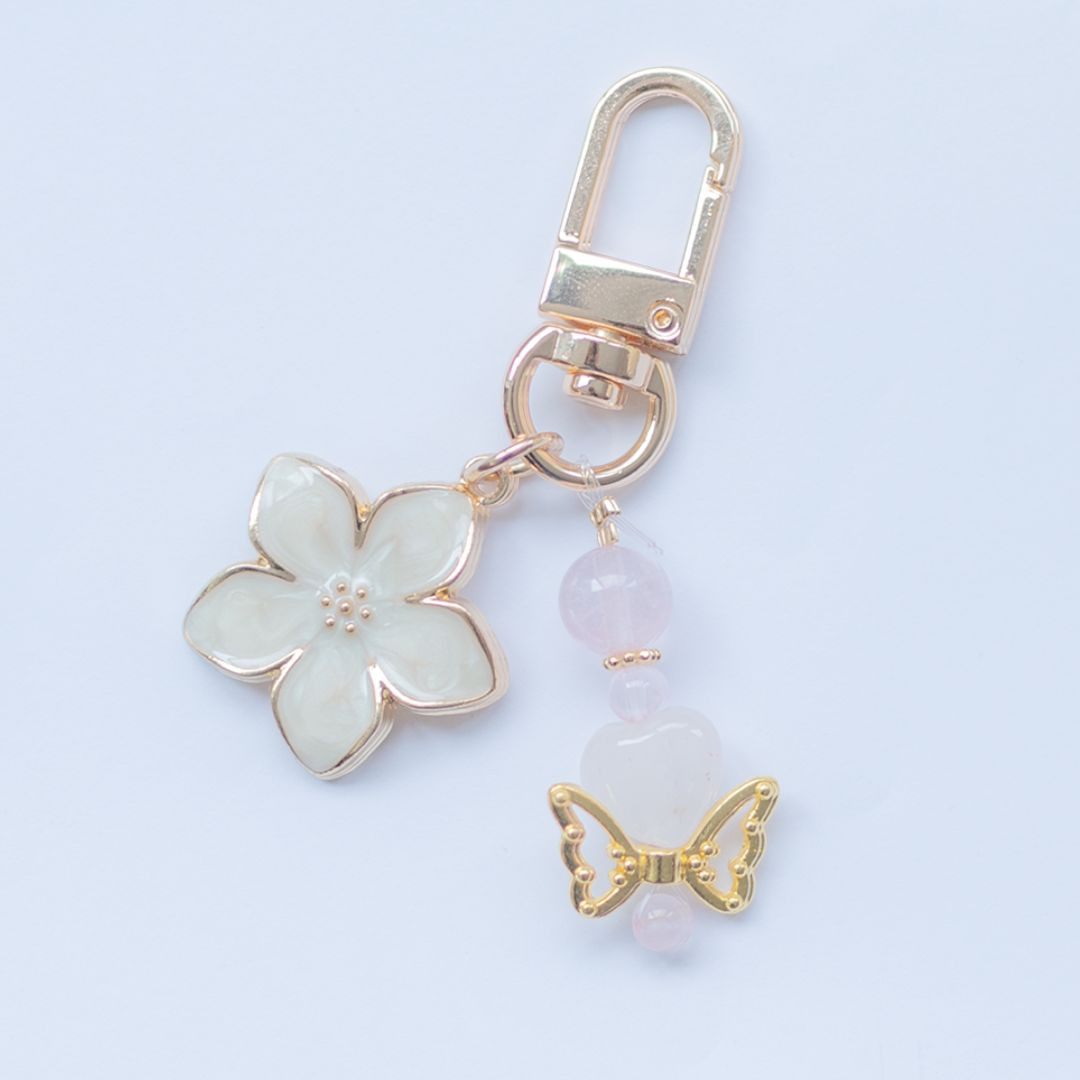 ローズクォーツスマホアクセサリー 桜・蝶 ピンク＆ホワイト｜恋愛運