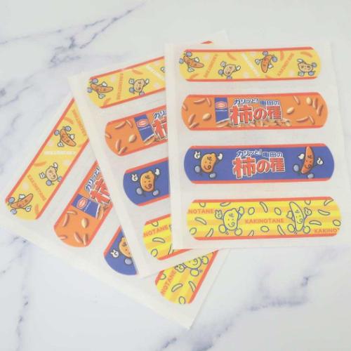 絆創膏 ばんそうこう 亀田の柿の種 お菓子パッケージ ジェイズプランニング バンドエイド キャラクター
