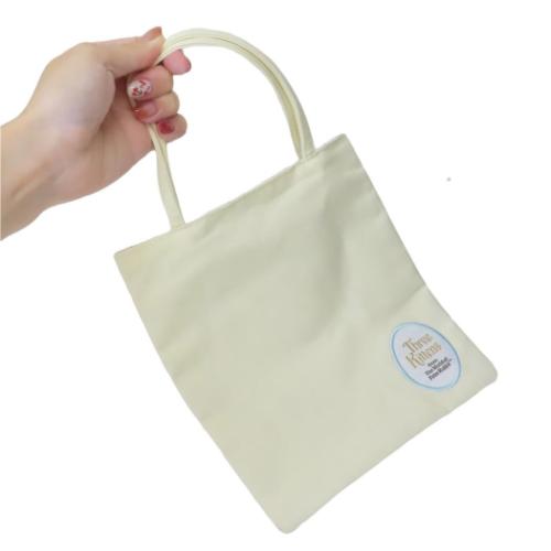 ミニトートバッグ ミニバッグ ピーターラビット シンプルフラワーイエロー 丸眞 手提げかばん 小さい 絵本キャラクター