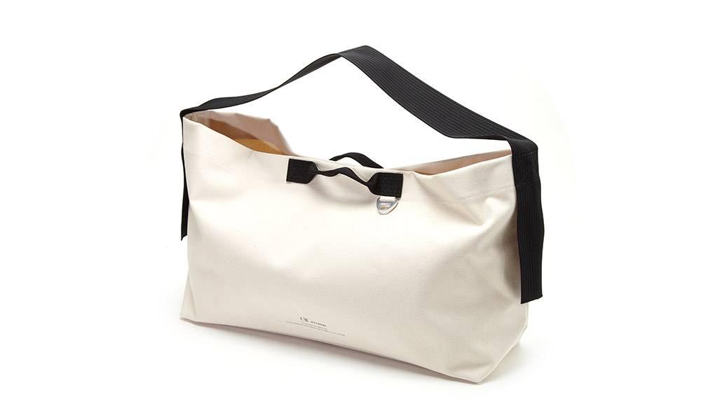 エフシーイー F/CE. ショルダーバッグ W.R CANVAS NEWS PAPER BAG FWR32221B0006