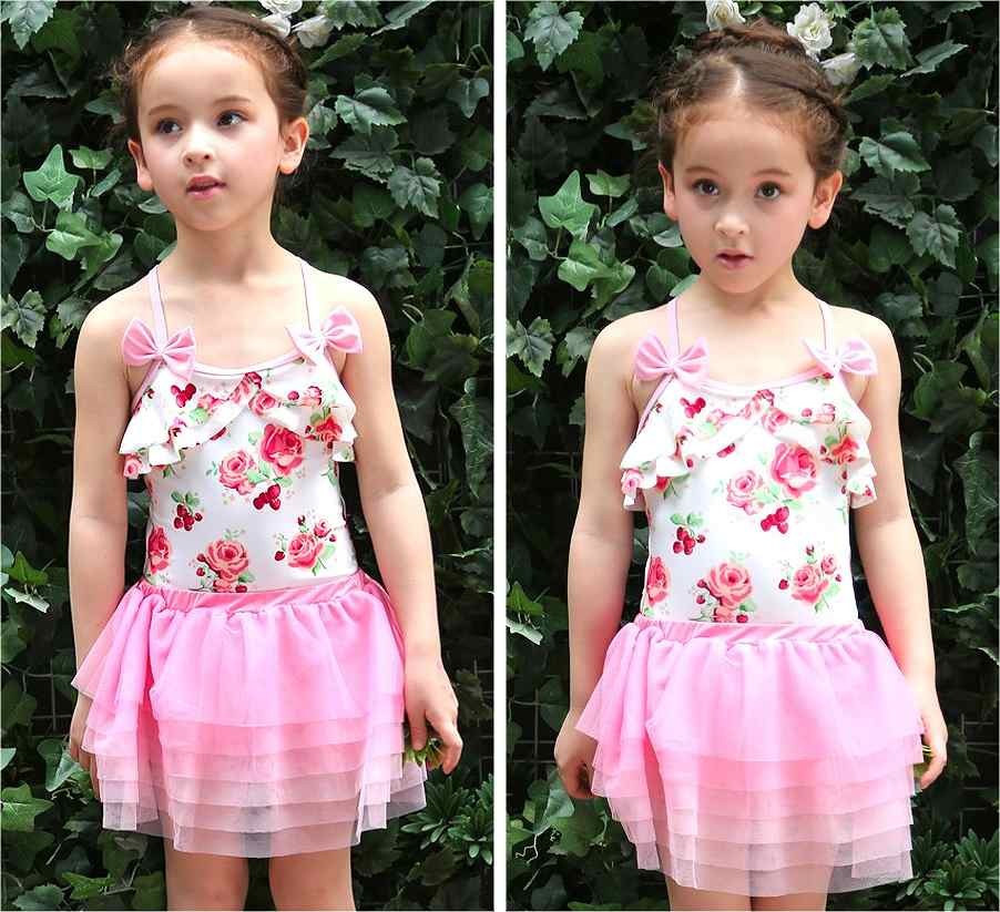 キッズ　ジュニア　女の子　水着　ワンピース　スカート　キャップ　セット　総柄　フラワー　花柄　リボン　スイムウェア　かわいい　キュート　夏　ビーチ　リゾート　マリン　海水浴　プール　スイミング　ホワイト×ピンク　送料無料