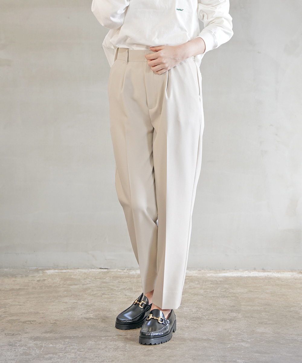 ストックアンドインテリジェンス センタープレス テーパードパンツ