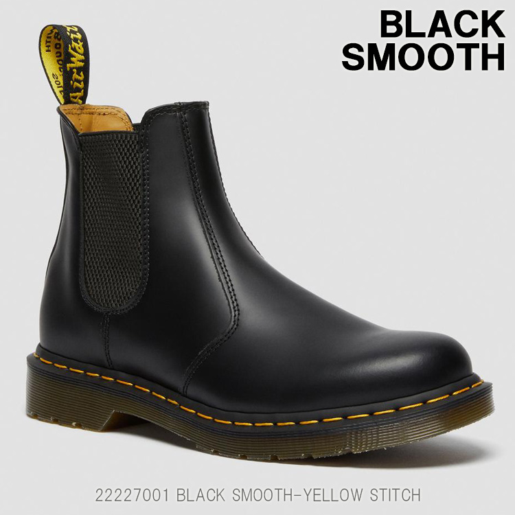 black boots yellow stitching