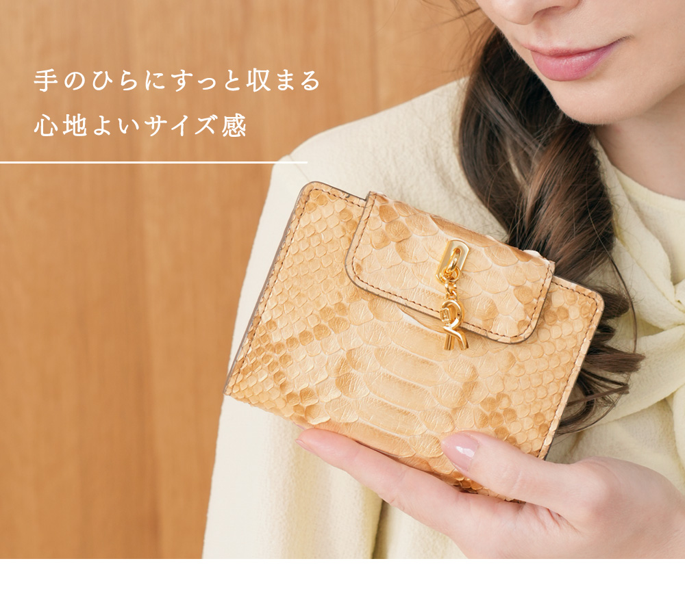 【ロベルタ】幸せを呼ぶ「太陽の宝石」がテーマ。2つ折り財布Python Amuleto（パイソン アムレット） シトリンゴールド  金 ダイヤモンドパイソン 二つ折りの画像
