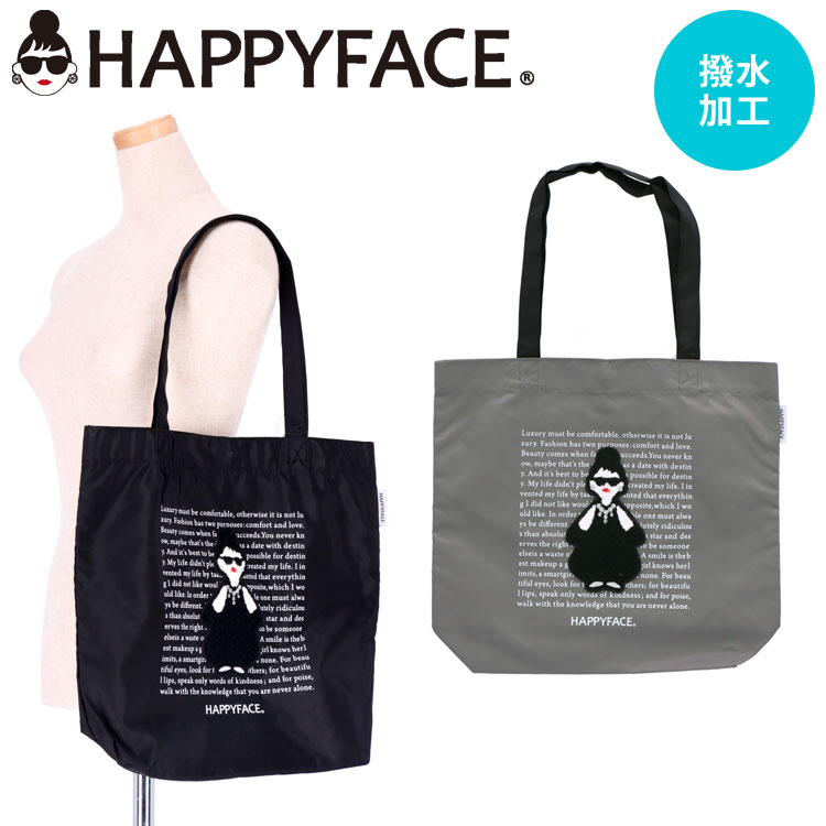 トートバッグ HAPPY FACE EMMA 英字背景 相良刺繍 全身 サングラス