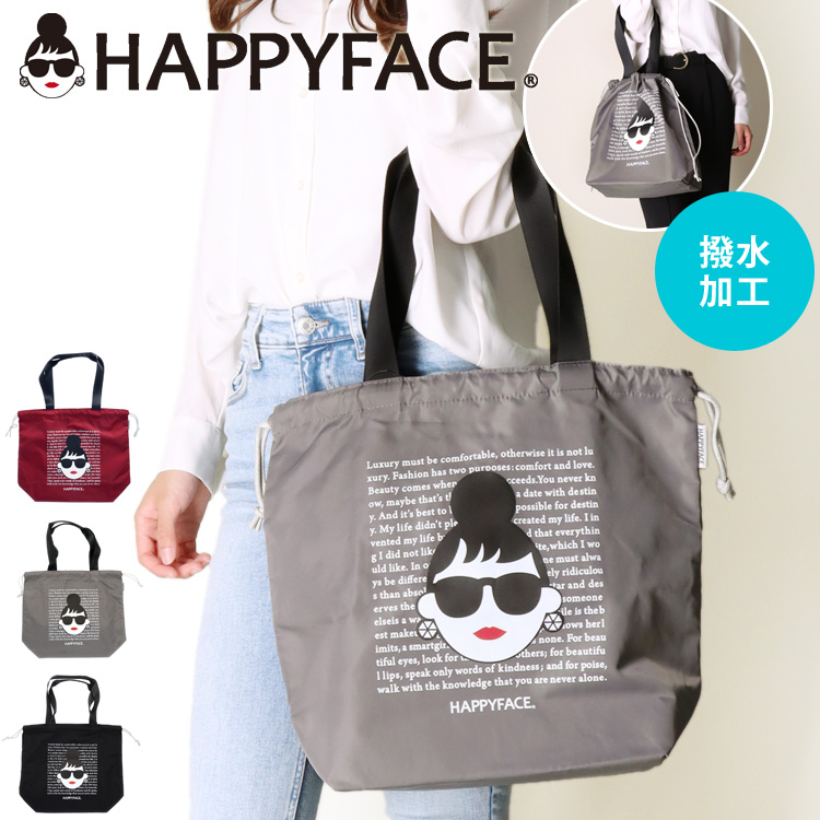 トートバッグ HAPPY FACE EMMA 英字背景 プリント 巾着 お顔