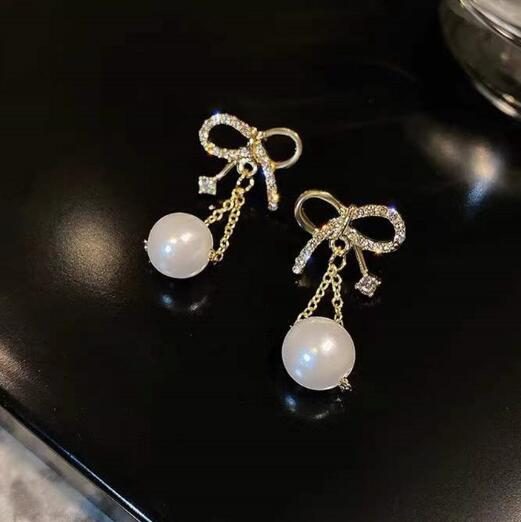 ピアス 一粒パールリボンデザインピアス 送料無料 おとな かわいい