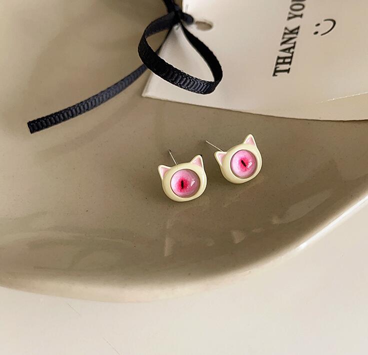 ピアス リアル猫目ピアス 送料無料 ねこ キャッツアイ ピンク
