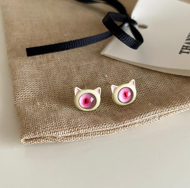 ピアス リアル猫目ピアス 送料無料 ねこ キャッツアイ ピンク