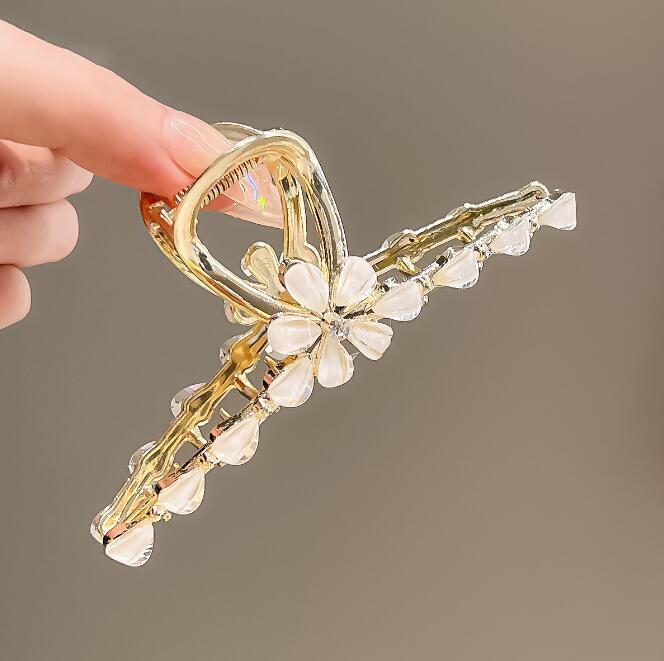 ヘアクリップ シャンパンカラークリスタルフラワーメタルバンス