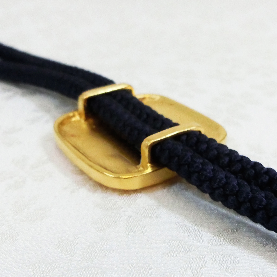 大慈無辺｜北村西望：原型制作｜純金製ループタイ 造幣局刻印品