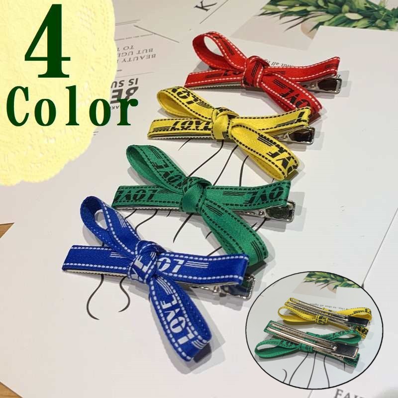 送料無料 テープ リボン ヘアクリップロゴ 文字入り 赤 黄色 クリップ