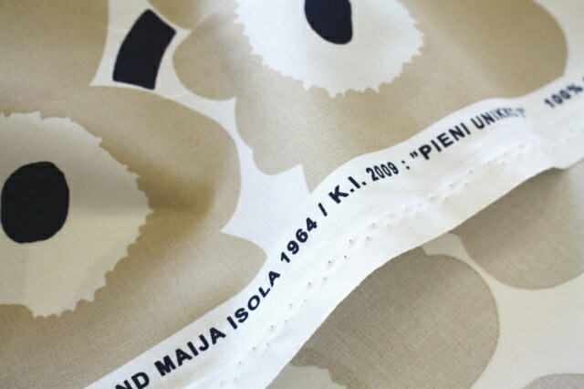 marimekko（マリメッコ） 生地 ピエニ ウニッコ ベージュ 巾145cm 10cm