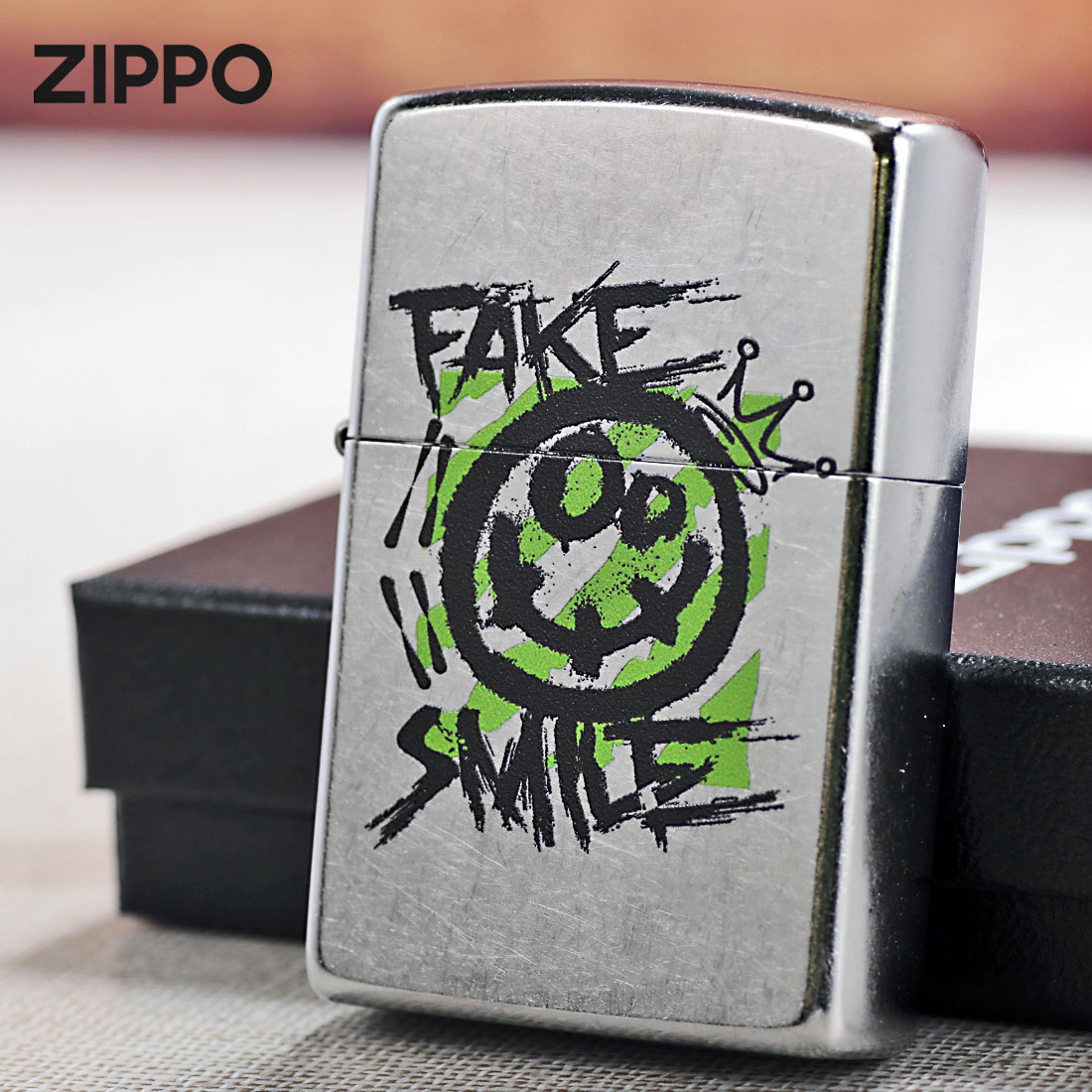 zippo(ジッポーライター)FAKE SMILE　フェイクスマイル　ストリートクローム　エンボスプリント加工　EP-KG （ネコポス可）