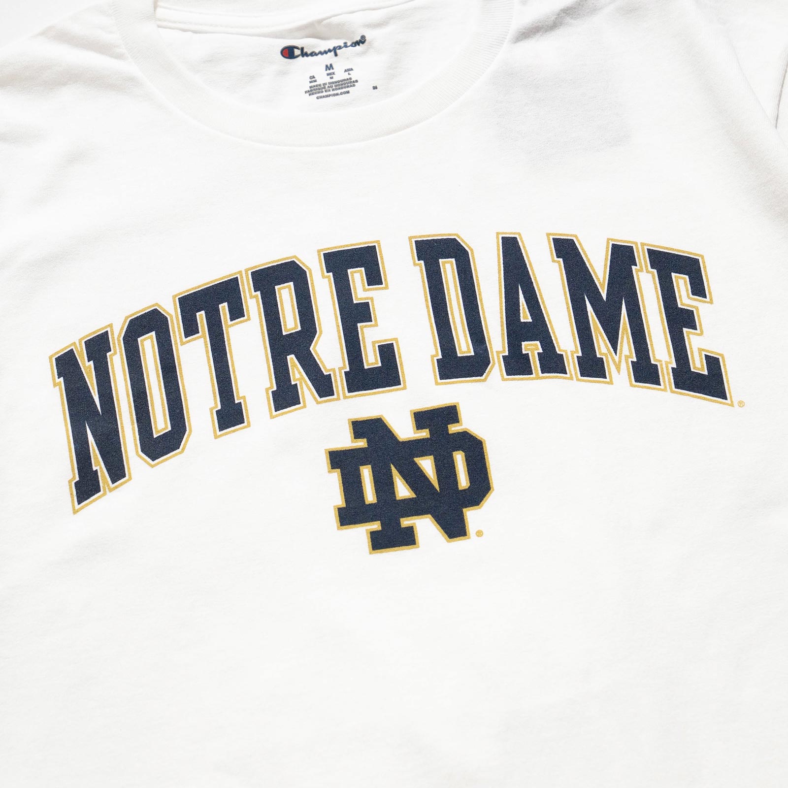 ノートルダム大学 ユニフォーム Champion UNIVERSITY OF NOTRE DAME オフィシャルロゴ カレッジT