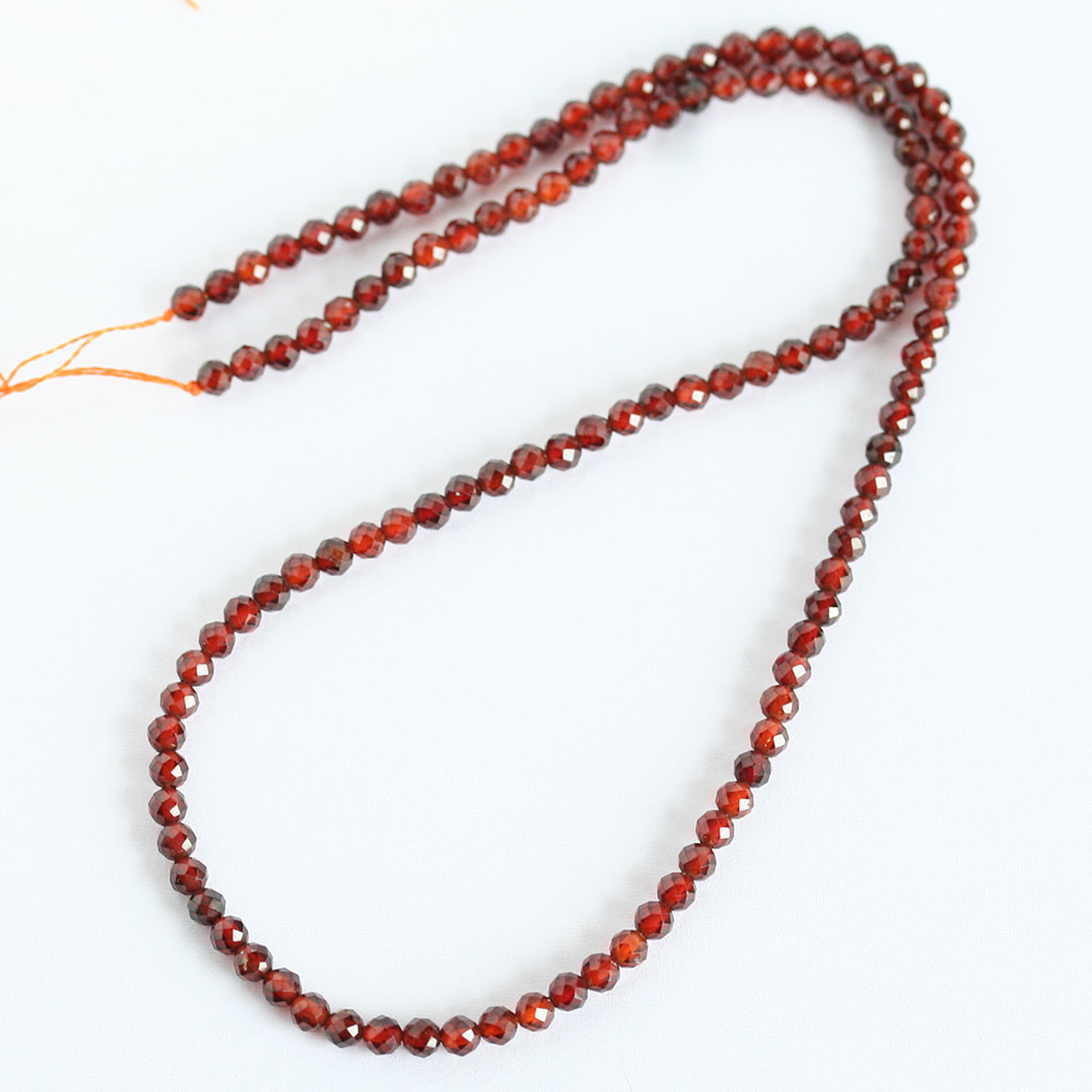 天然石 ヘソナイト 64Fカット 約3mm 中国産 約37-39cm オレンジ