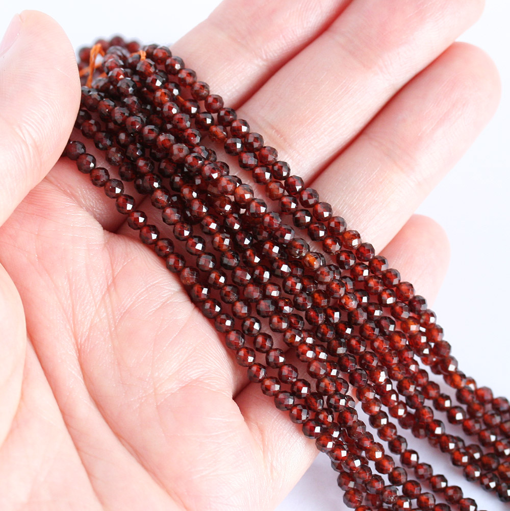 天然石 ヘソナイト 64Fカット 約3mm 中国産 約37-39cm オレンジ