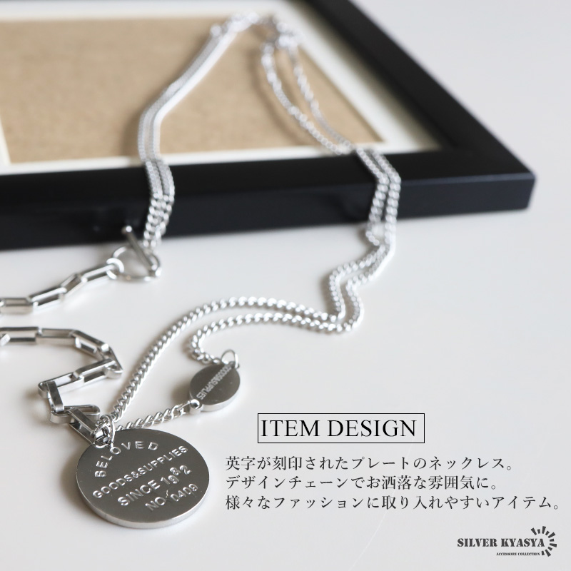 黒いドレスの女性銀貨ペンダント