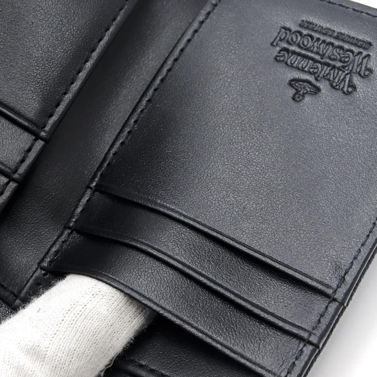 未使用 Vivienne Westwood 折財布 シンプル がま口 定番 黒 ヴィヴィアンウエストウッド Vivienne Westwood 財布 二つ折り財布