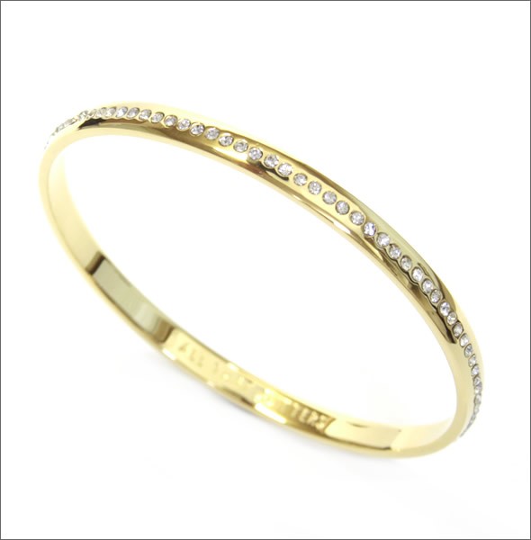 ケイトスペード WBRU9701-921 IDIOM BANGLES 内側にさりげなく刻印された「ALL THAT GLITTERS」のロゴがキュートなクリスタル・パヴェ バングル