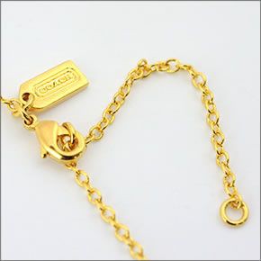 コーチ ≪取り寄せ商品≫ パヴェ ハート・スクエア・ハイヒールモチーフ ネックレス 95852 GD/PK/N