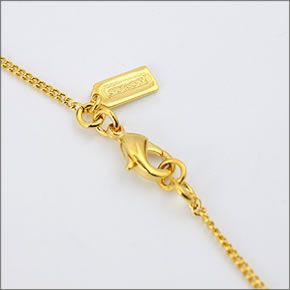 コーチ ≪取り寄せ商品≫ ニューべイブ ピースサイン ハートモチーフ パヴェ ネックレス 96115 GD/GD/N