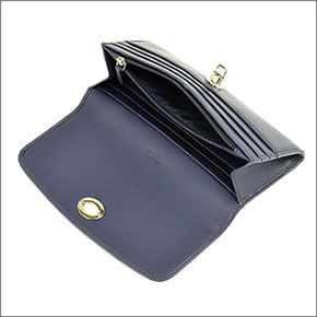 コーチ ≪取り寄せ商品≫LEGACY レガシー パーフォレーテッド パンチングレザー 二つ折り長財布 ネイビー 49059 SVB3U