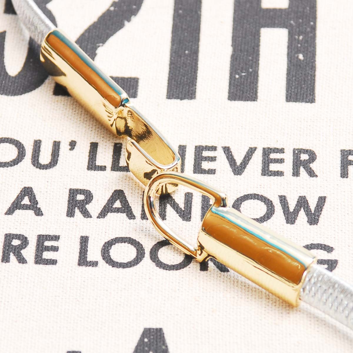 ムルーア ゴールドバックル細ゴムべルト シルバー 銀