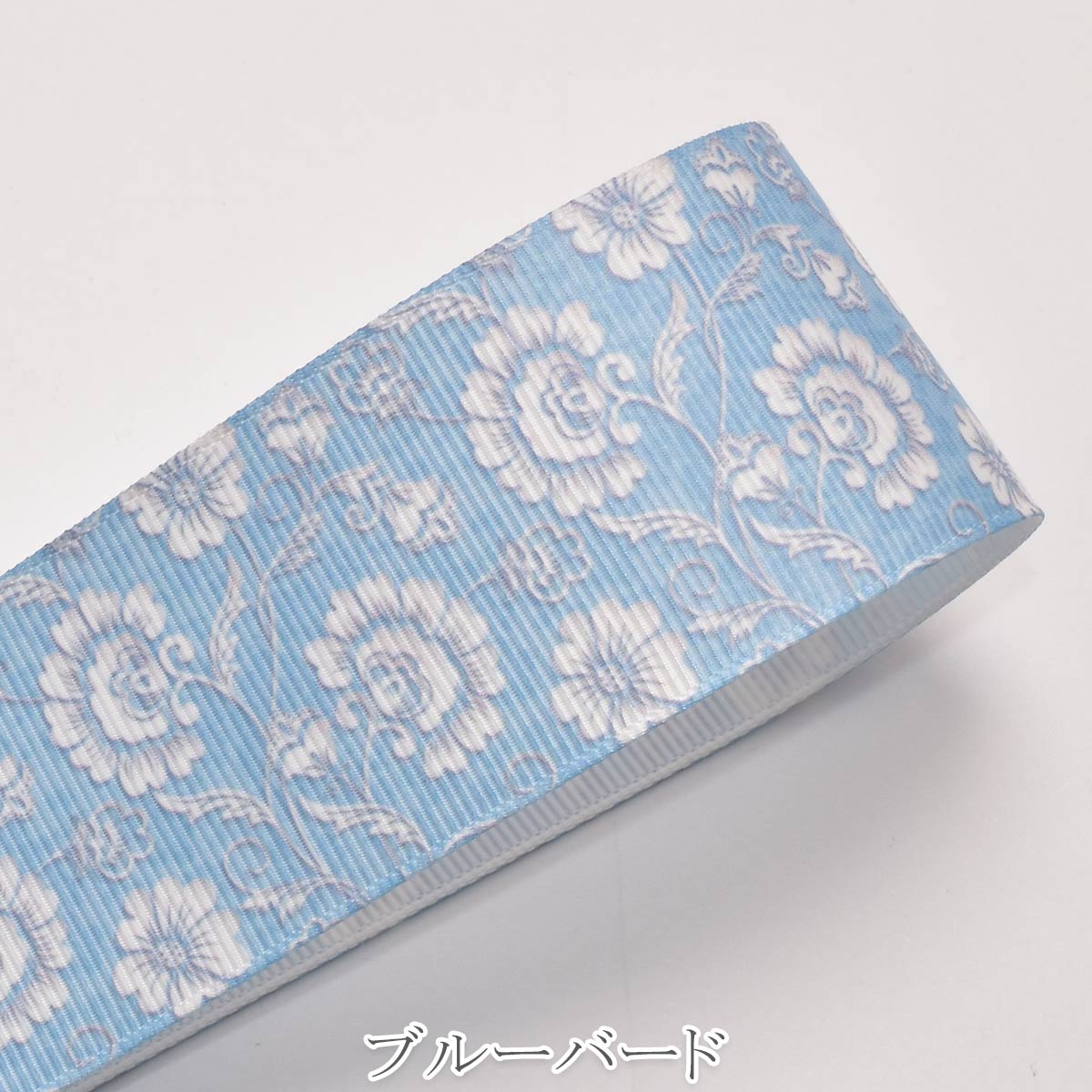 プリントリボン カントリーフラワーの水色リボン 幅38mm 1m単位