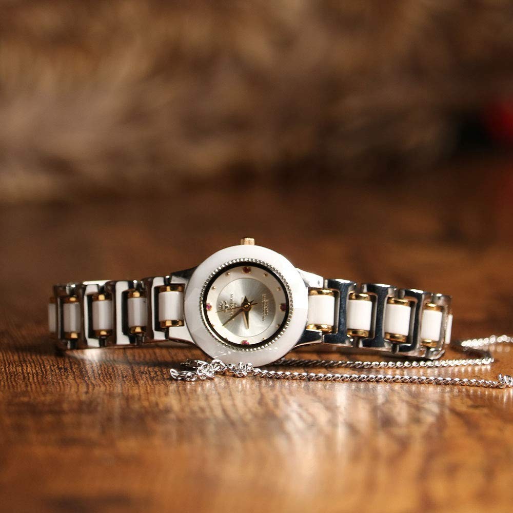 レディース腕時計 天然宝石付 8面カットクリスタルガラス 18金リューズ