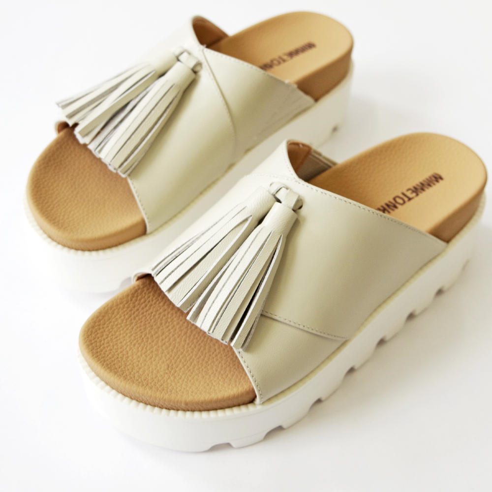 新品】MINNETONKA/ミネトンカ タッセルサンダル 23cm - メルカリ