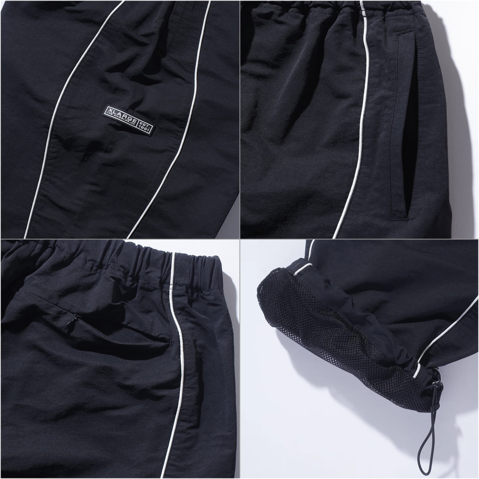 XLARGE（エクストラ ラージ） ナイロンパンツ CURVED NYLON PANTS