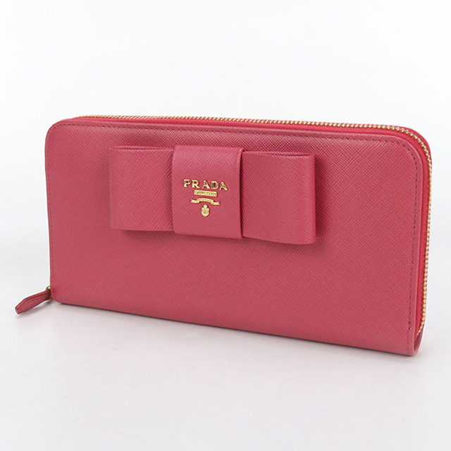 PRADA プラダ ラウンドファスナー 1M0506 長財布 サフィアーノレザー ピンク【中古】 レディース PRADA - 美品 プラダ ラウンドファスナー リボン 1M0506 レザー