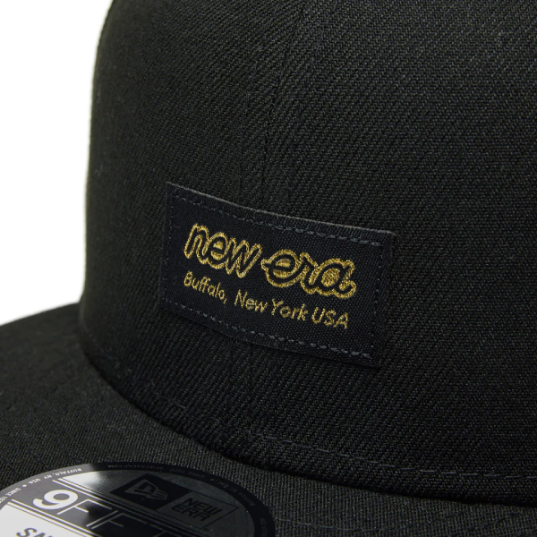 ニューエラ 9FIFTY メタルフラッグ ウーブンパッチ ブラックxゴールド