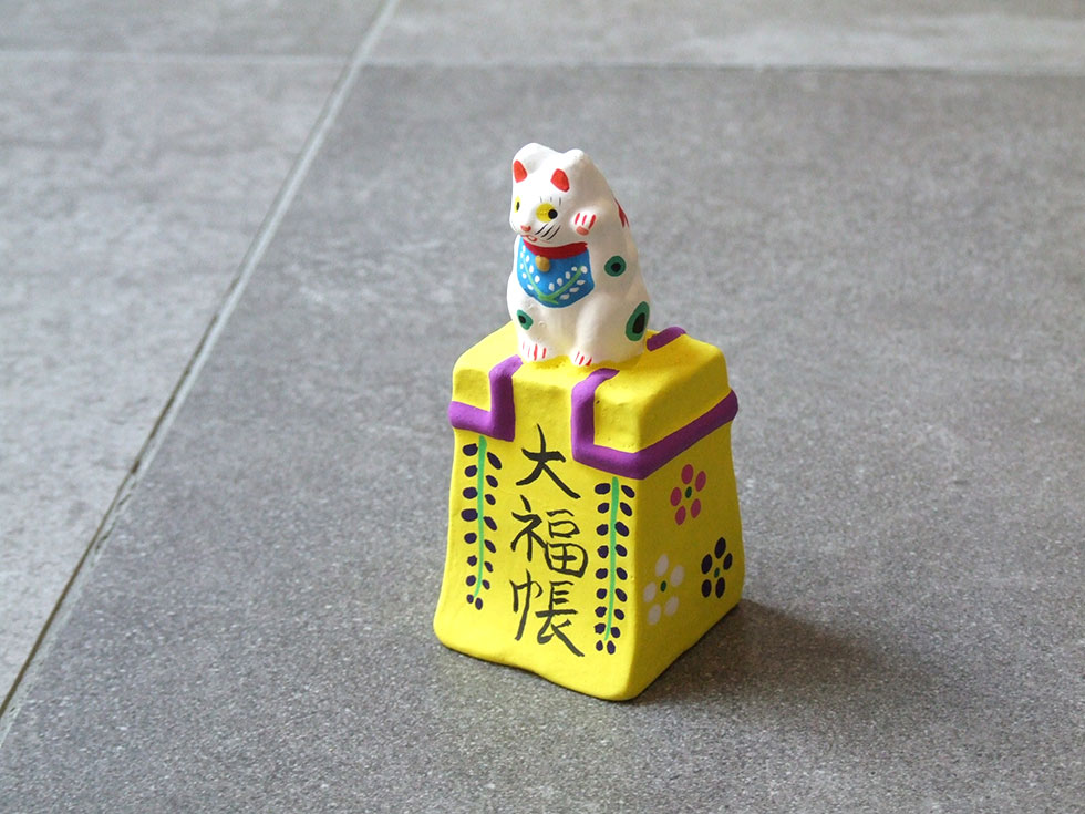 郷土玩具 民藝 福島県 工房千想 大福帳乗り猫 黄 縁起物 置物 開運