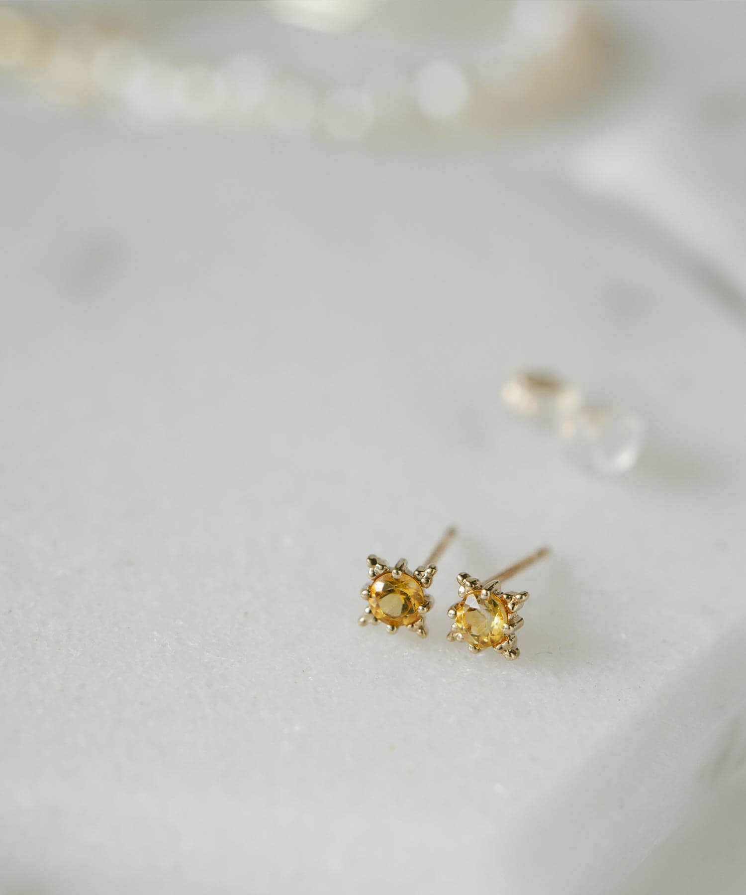 Ops. シトリン つけっぱなし ピアス 天然石 星 金属アレルギー
