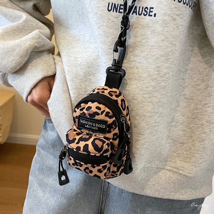 ヒョウ柄バネ口ポーチ 縦型ポーチ ミニバッグ 小物入れ
