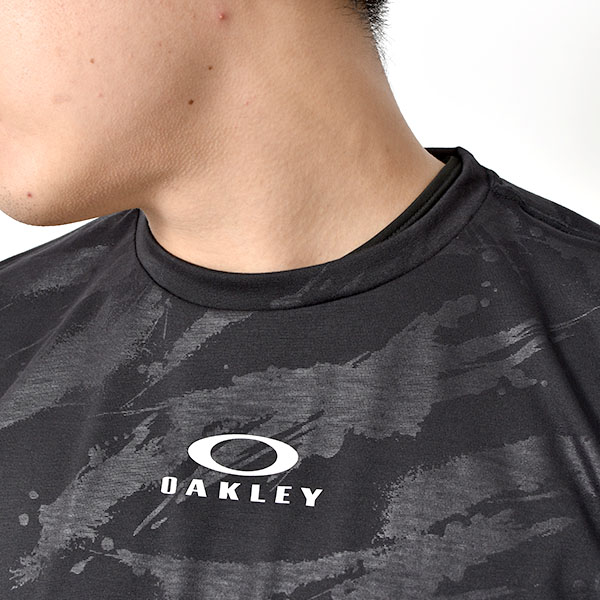 得割32 半袖 Tシャツ OAKLEY オークリー メンズ 総柄 ロゴ プリント