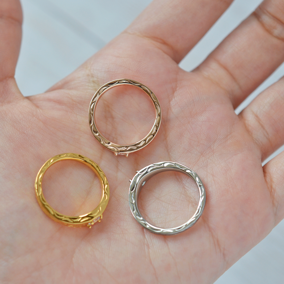 ハワイアンジュエリー リング 指輪 サージカルステンレス キュービックジルコニア 星 スクロール 金属アレルギー対応 爆買の画像