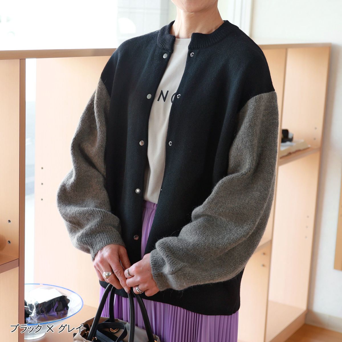 Dignite collier（ディニテコリエ） カーブスリーブ バイカラーニット