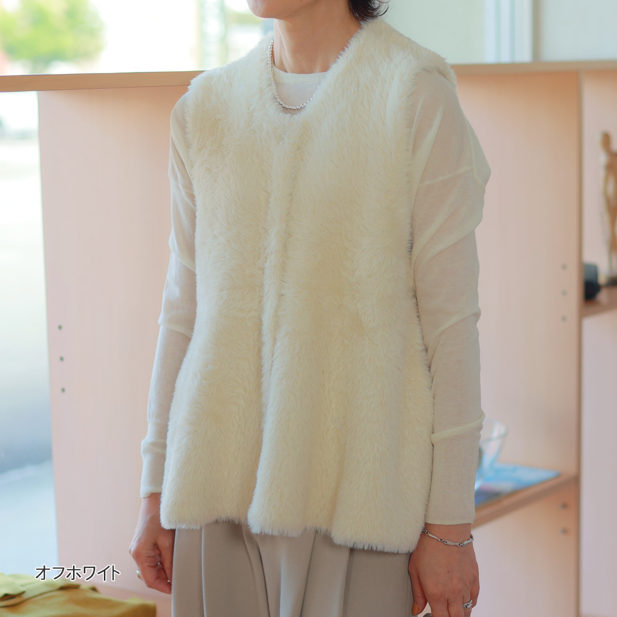 Dignite collier（ディニテコリエ） フェザーヤーン ペプラムジレ