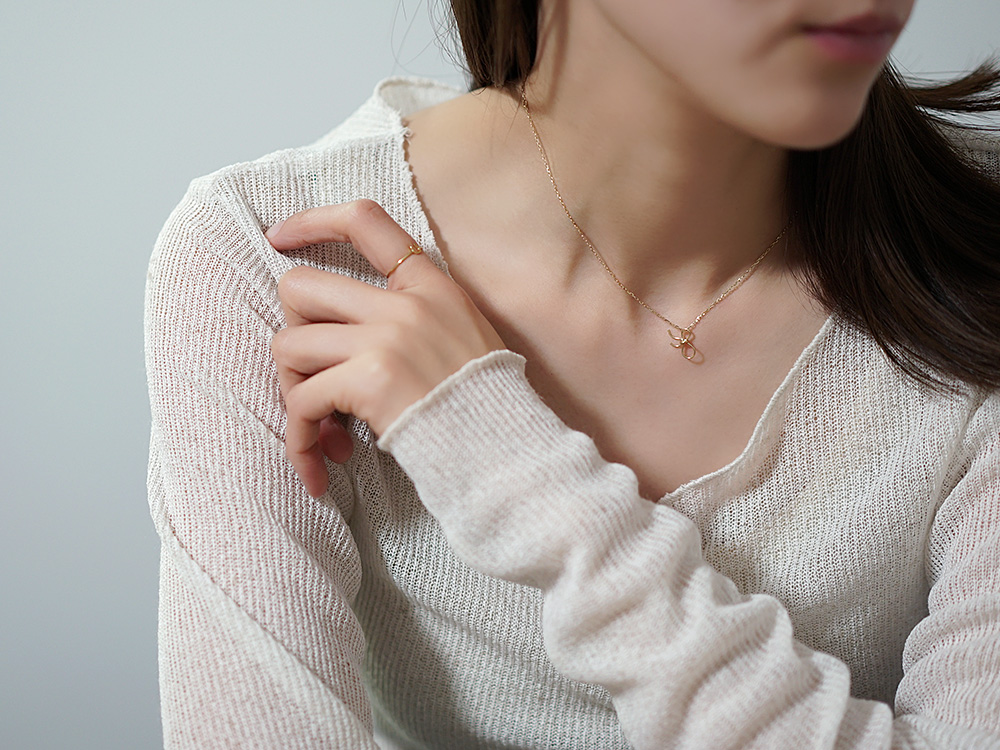 18K ペンダントトップ　ネックレス　ゴールド　リボン　チャーム 27148_a_01.jpg