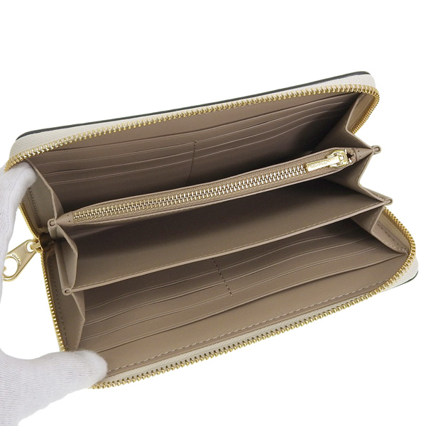 COACH（コーチ） シグネチャー MYSTICAL FLORAL PRINT LONG ZIP WALLET