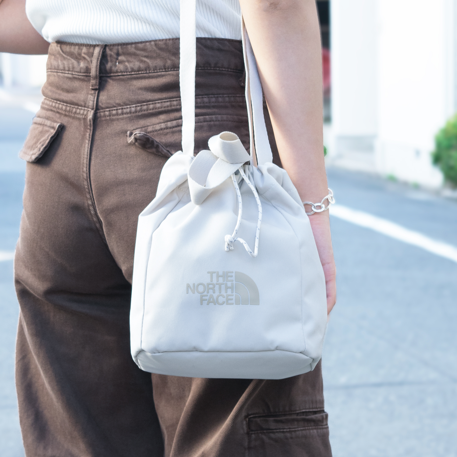 ノースフェイス ショルダーバッグ メンズ レディース クリーム BUCKET BAG MINI NN2PP51K THE NORTH FACE ホワイトレーベル｜riverall