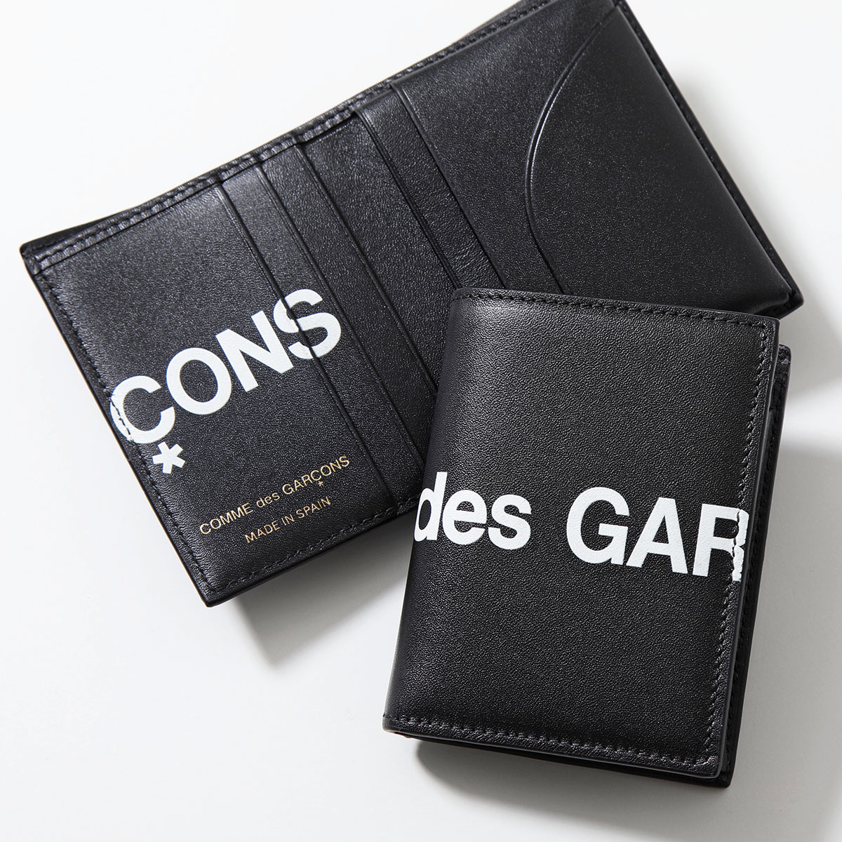 COMME des GARCONS コムデギャルソン 二つ折り財布 HUGE LOGO SA0641...